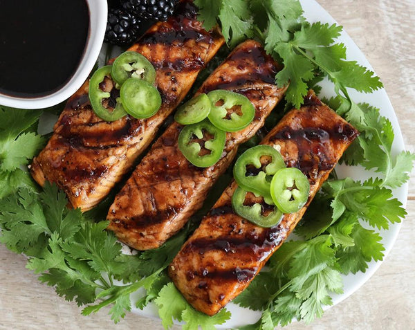 grilled salmon topped with a blackberry glaze made with Ravens Nest blackberry jalapeno jam